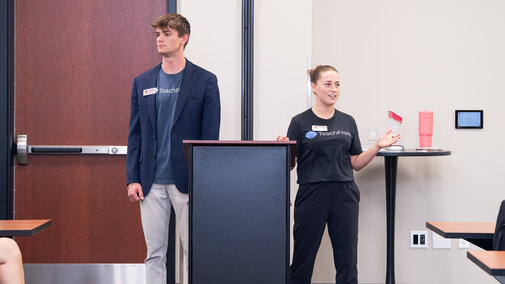 Teachfront students pitching their startup to an audience