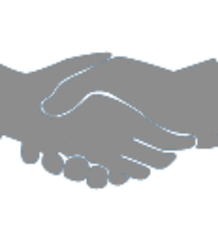 A graphic representing two hands engaged in a handshake.