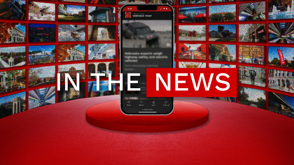 A graphic of a smartphone with the text "In the news" superimposed over it.